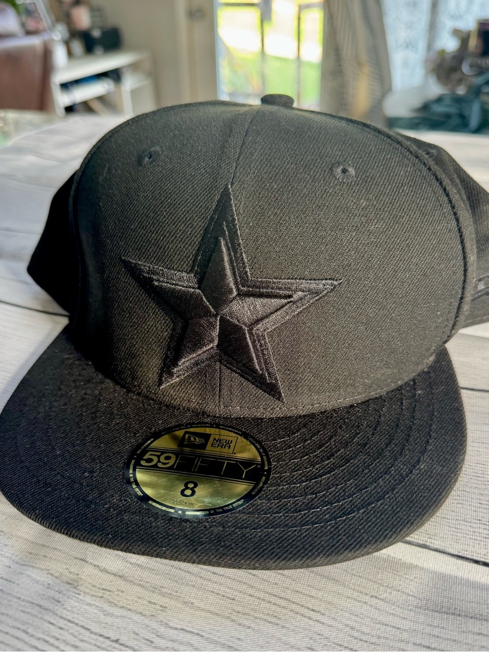New Era Men’s Black Dallas Cowboys flat bill NFL hat. Size 8, brand new!